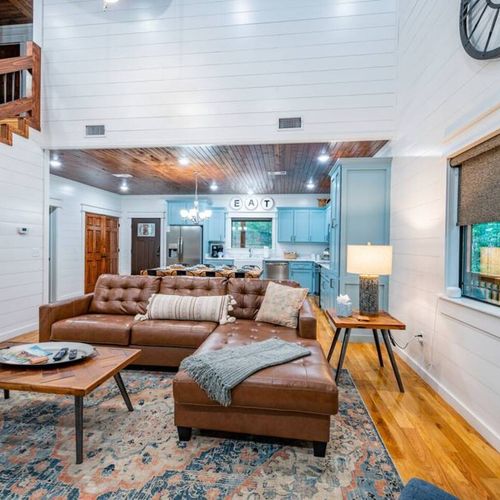 You are greeted by an open floor plan, ensuring you never miss a moment