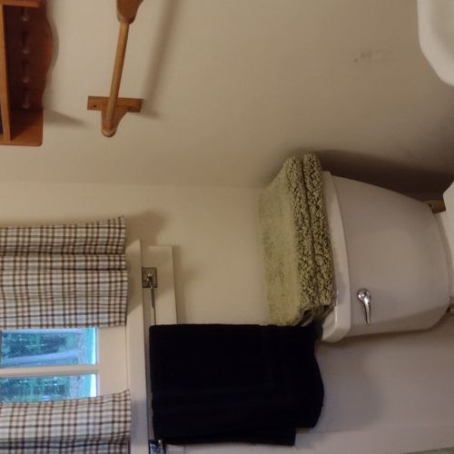 Bathroom:  the cabin has a full bathroom with a shower, sink, and toilet.