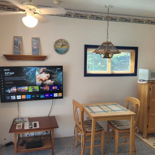 Main room:  the television and dining table