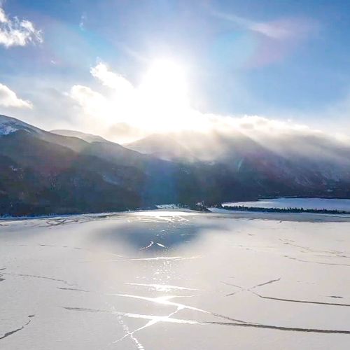 A stunning canvas of twin lakes and mountain peaks.
