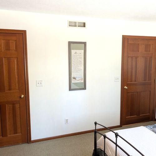 BEDROOM #3 (SECOND FLOOR):  Cute bedroom on the second floor featuring a queen-size bed, dresser, mirror, nightstand, lamp, and private entrance to the "jack and jill bathroom" on the second floor.