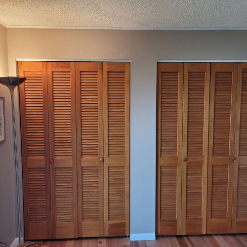 Bedroom #2 (first floor):  features a full-size bed, two closets, television, private entrance, and a great view of crystal lake!
