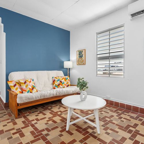 Experience homely warmth mixed with modern elegance in our spacious lounge area, designed for relaxation and comfort.