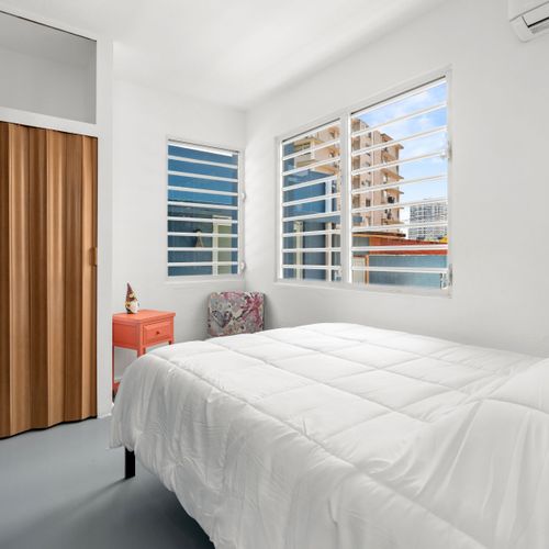 With ample storage space provided by the built-in wardrobe featuring wooden finishes, unpacking and settling in is a breeze - feel right at home!