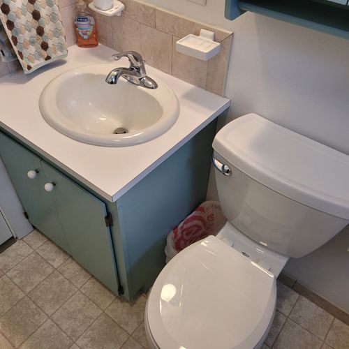 Bathroom #1:  full bathroom with a combination tub and shower.