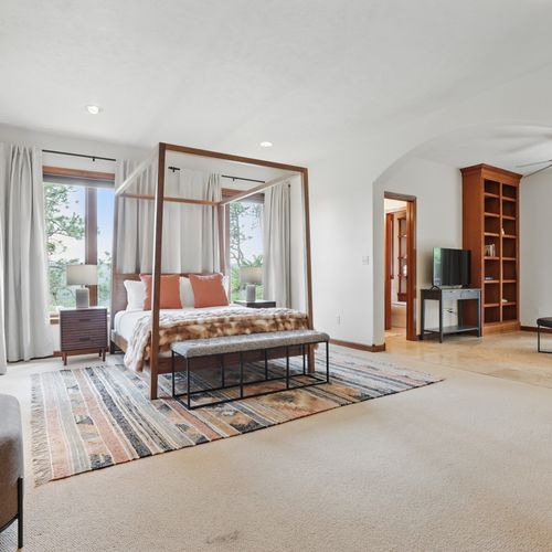 Wake up refreshed, wrapped in comfort and stillness, in the master bedroom’s king-size bed.
