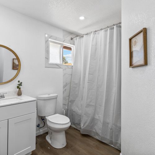 A second bathroom is also located upstairs, and includes a sink, toilet, and tub/shower.