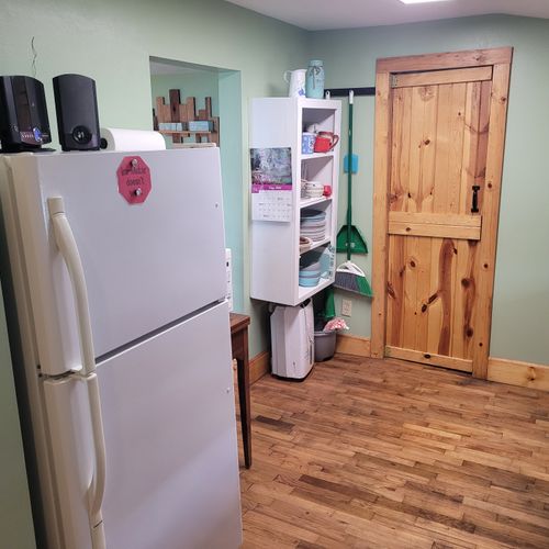 Kitchen:  the kitchen with the fridge in the back