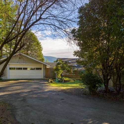 Parking for two cars in front of the garage.  There is an area for one or two more cars as needed.
