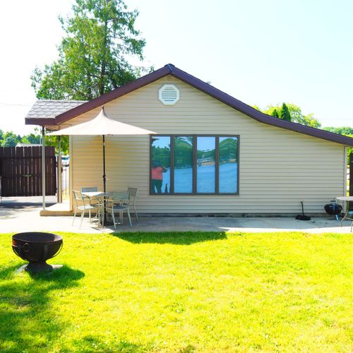 Exterior:  the back of the house in summer.