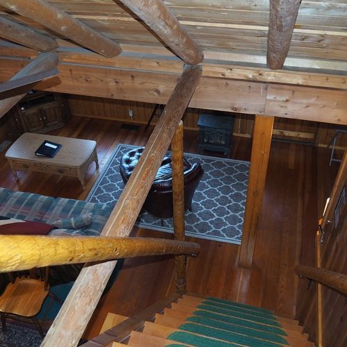 Living room:  looking down into the living room from the upstairs loft area.