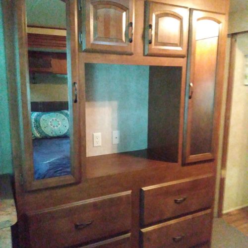 Bedroom #1:  features a queen-size bed, dresser, and a great view of little platte lake.