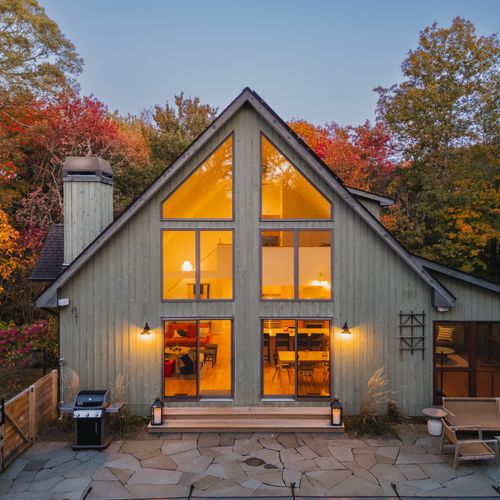 Beautiful picture windows overlook the back patio