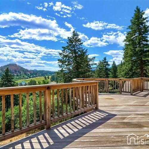 Enjoy the massive elevated deck w/ outdoor seating.