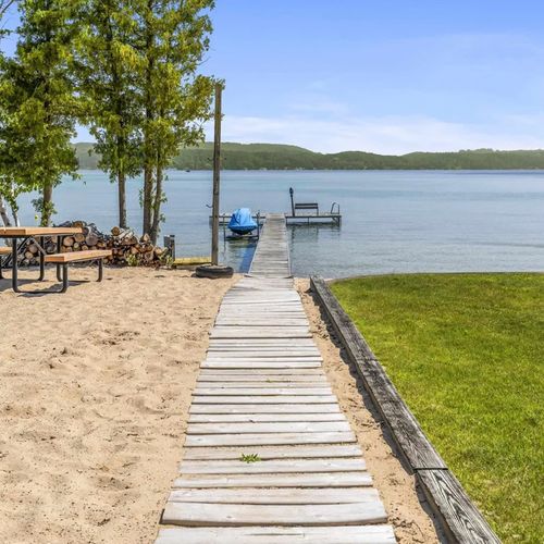EXTERIOR:   The private dock and huge private beach