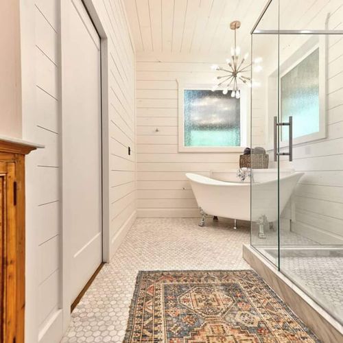 Soaking tub and double head walk-in shower.