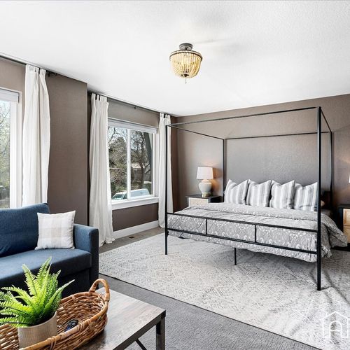Relax and unwind in this luxurious master bedroom. With plenty of natural light and plenty of storage, this bedroom is your perfect oasis.