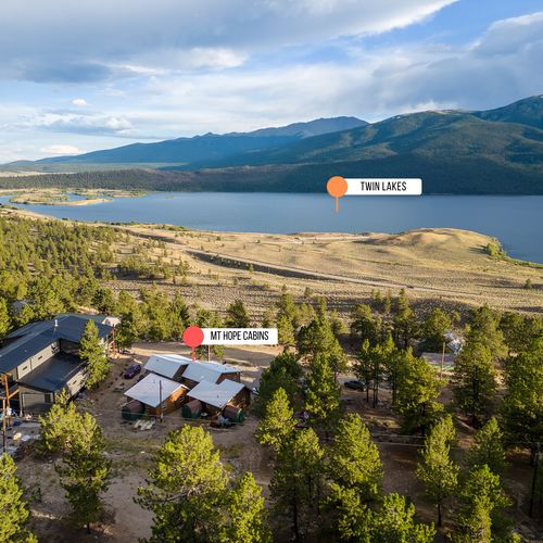 Cabins perched above crystal-clear waters of twin lakes, colorado.