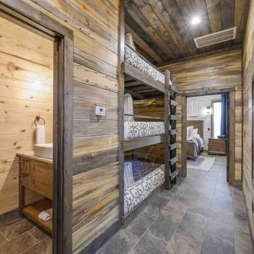 The hallway unveils 3 full-size bunk beds