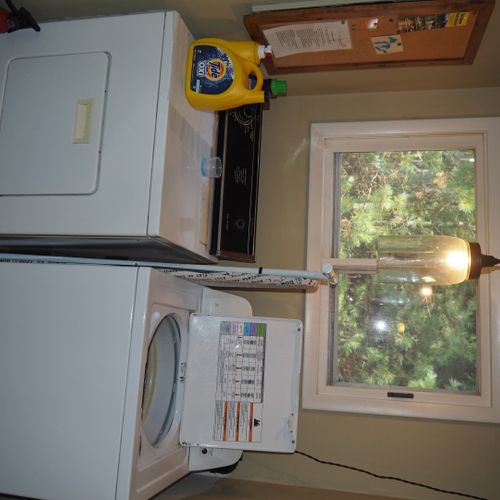 Laundry area:  the chalet has a top load washer and front load dryer between the main entrance and the kitchen.