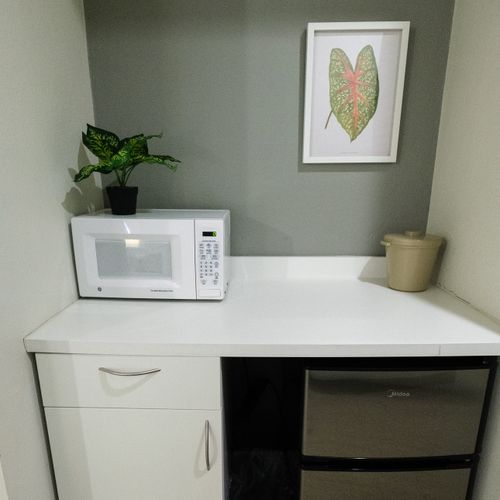 Prepare light meals or snacks with ease in your personal kitchenette, complete with a microwave and mini-fridge for ultimate convenience during your stay.
