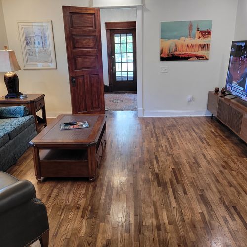 Living room #1 (main floor):  the home has a very stylish living room with a very large live-streaming television.