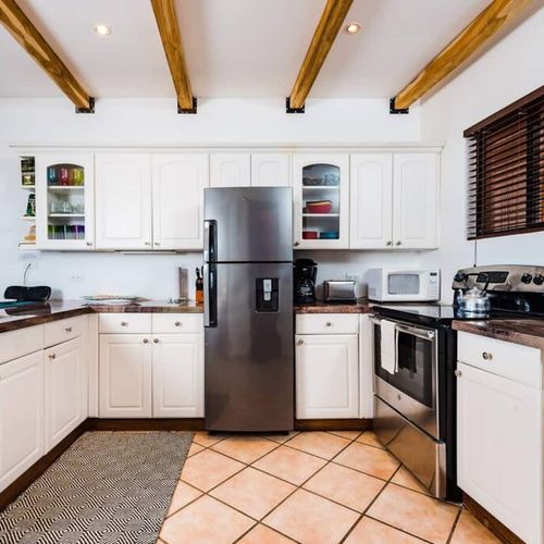 This kitchen has plenty of counter space to cook up a delicious meal.