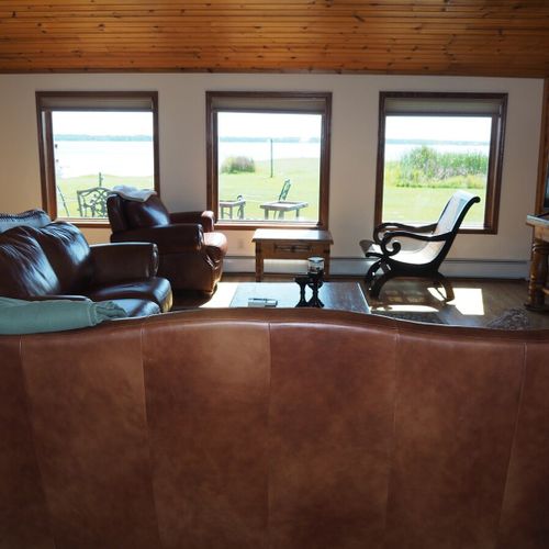 Living room:  the cabin has a huge living room with a gas fireplace and 
 great lake views!