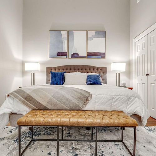 Sprawling king bed in the 2nd floor master — rest easy after a big day out.