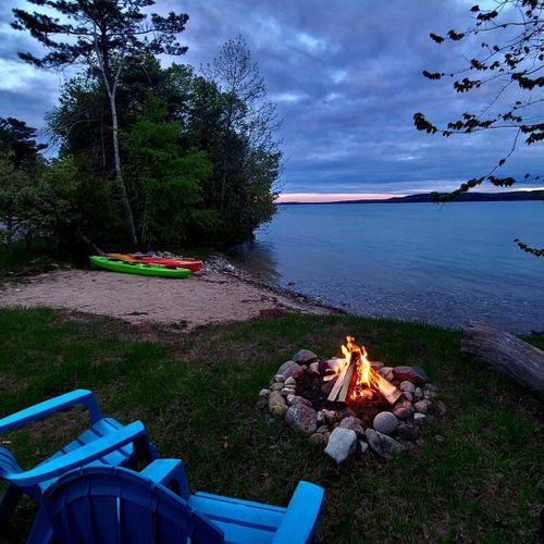 Exterior:  the private bonfire ring, beach, and 2 kayaks that are available for guests to use.