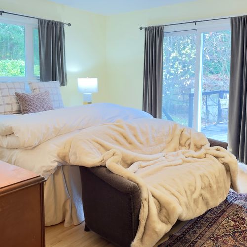 Wake to soft natural light and forest views, then step straight onto the deck with your morning coffee. Plush bedding, layered blankets, and blackout curtains make it easy to sleep in—or wind down early after a day outside.