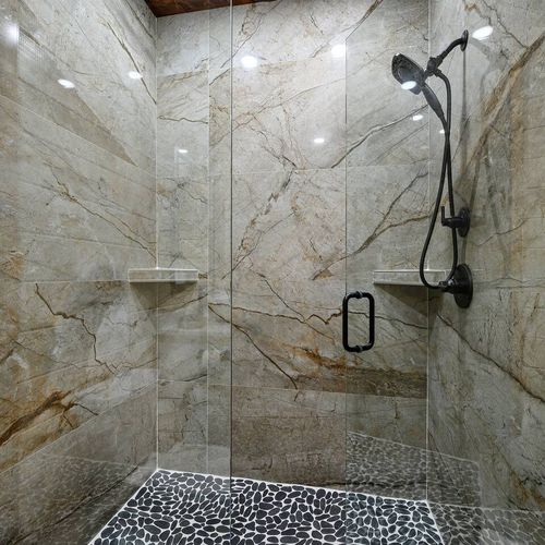 This King Suite has a private full bathroom with a walk-in shower.