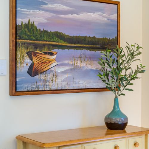 Original art and beautiful decor make this home special.