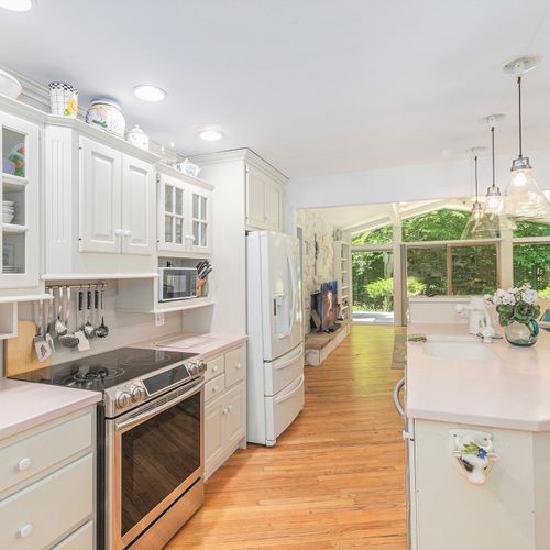 KITCHEN:  The large kitchen with all appliances and a good supply of cooking and dining utensils.