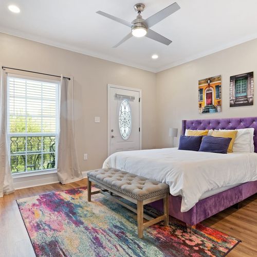 Sun-filled master bedroom w/ an ensuite bath for a private, relaxing retreat.