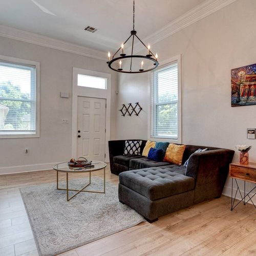 Kick back in the living room w/ a SmartTV — perfect for movie nights with the crew.
