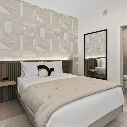 Sink into the comfort of our cozy bed.