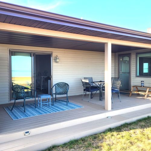 OVERVIEW:  The gorgeous back patio, with outdoor dining and a wonderful view of Lake Huron