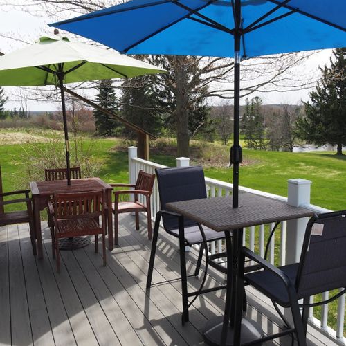 Exterior:  the fun outdoor dining tables on the back patio.
