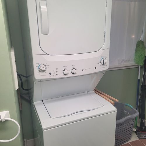 Bathroom #2 (main floor):  full bathroom with a walk-in shower and also a stacked washer and dryer.