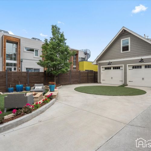 A convenient two-car garage is available for your use, offering ample space for parking and storage.