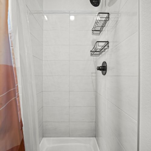 Cozy ensuite with a walk-in shower.