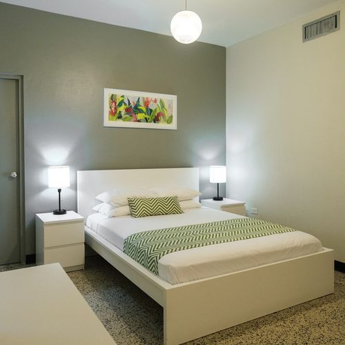 Sink into the luxurious comfort of our bed, adorned with soft pillows and crisp linens, guaranteeing you a peaceful and rejuvenating night's sleep.