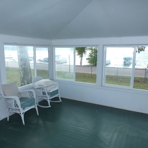 Porch:  the cottage has a huge wrap-around porch that is fully enclosed and has great views of crystal lake!