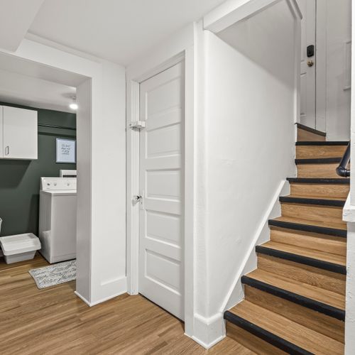 Organized laundry area with thoughtful design to match the home’s easy flow.