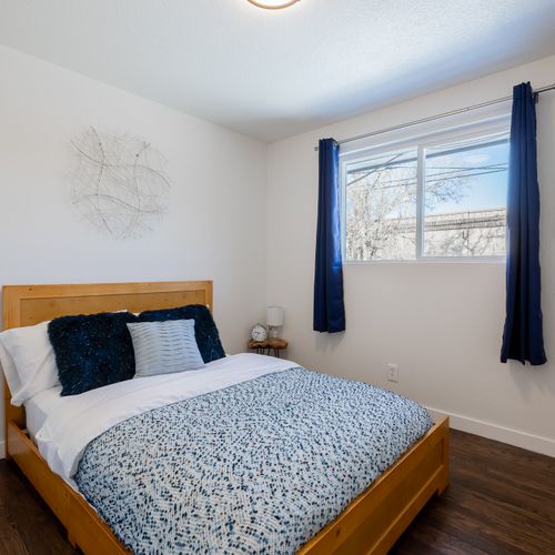 The third upstairs bathroom has a queen sized bed and a small closet for your belongings.