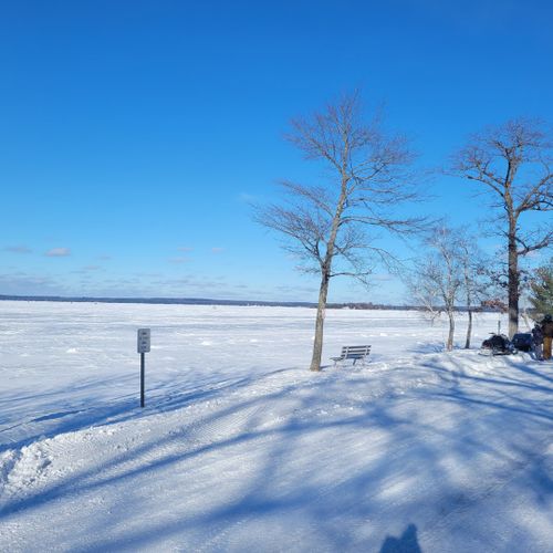 Exterior:  snowmobiling at higgins lake