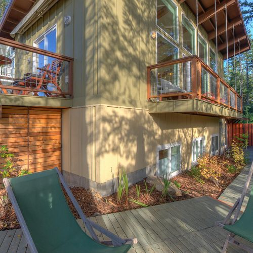 Views of the back balcony and patio off of the living room.