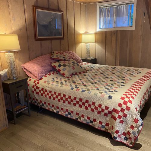 BEDROOM #3 (SECOND FLOOR):  Features king-size bed and lakeview from balcony