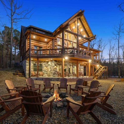 3-story ‘Fox Hollow Creek’ a luxury cabin with creek side views that sleeps 22!